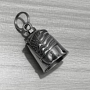 Detailed close-up of retro stainless steel guardian bell with US flag star and stripes
