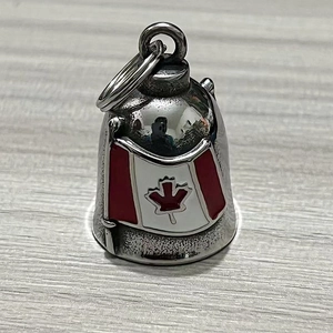 Polished stainless steel bell keychain with red Canada maple leaf flag enamel detail