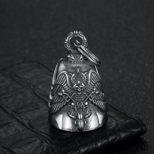 Vintage stainless steel guardian bell keychain with wings and motorcycle mask motifs