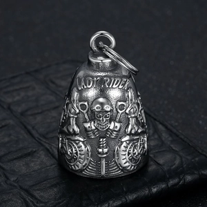 Retro stainless steel Lady Rider skull bell keychain with detailed motorcycle engine relief