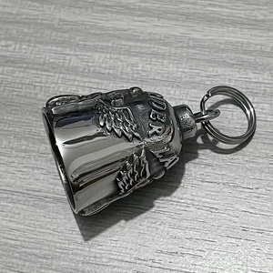 Detail view of silver stainless steel Guardian Bell pendant with embossed wing design