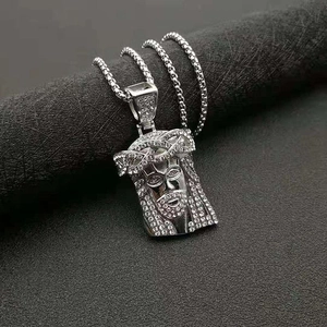 Collier hip hop avec pendentif tête de Jésus en acier inoxydable argenté et cristaux blancs