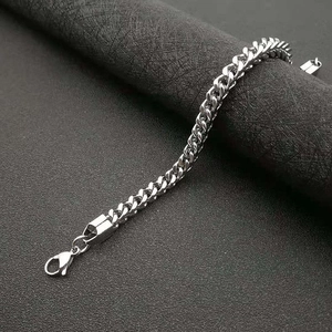 Classic silver stainless steel Cuban link bracelet for men with polished finish and lobster clasp