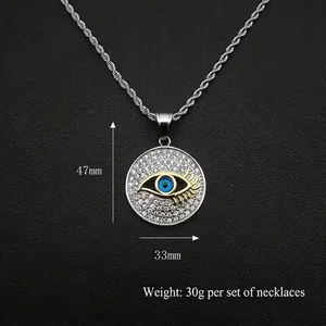 Gold plated iced out evil eye pendant necklace with 47mm height and silver rope chain