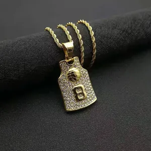 Detailed view of gold plated jersey pendant with number 8 and shimmering pavé crystals