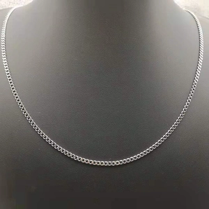 Minimalist 3mm stainless steel Cuban link chain necklace displayed on a black neck bust