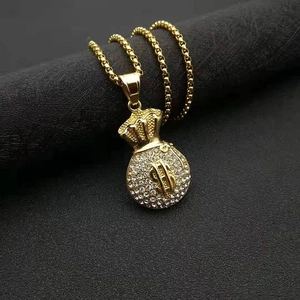 Pendentif sac d'argent hip hop plaqué or avec cristaux et signe dollar sur chaîne à billes