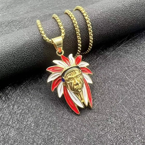 Detailed close-up of golden steel hip hop pendant with colorful enamel Indian chief