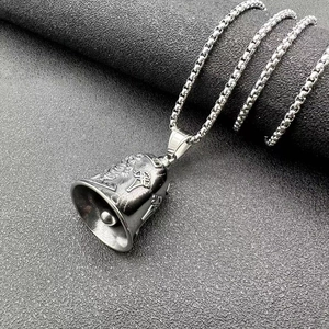 Detailed close-up of retro stainless steel St. Christopher biker bell with embossed patterns