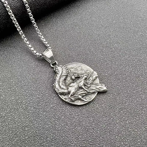Close-up of vintage titanium steel squirrel pendant with Nordic relief and box chain