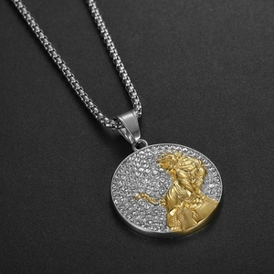 Iced out gold tiger medallion necklace with dual-tone pendant on silver box chain