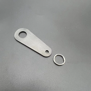 Close-up of industrial brushed stainless steel motorcycle bell hanger with split ring