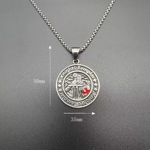 Close-up of Knights Templar pendant with red cross emblem and square pearl chain
