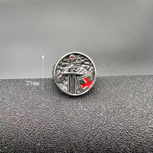 Detailed view of knight ring with red enamel cross shield and 21mm surface diameter
