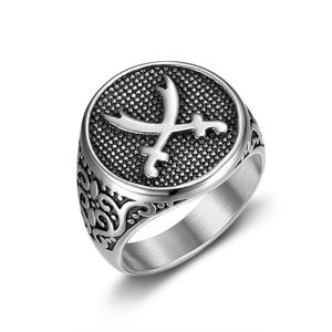 Vintage stainless steel ring with polished Arabic crossed swords and engraved sides