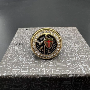 Detail of 23mm men's gold Templar ring with red cross shield and crystal bezel inlay