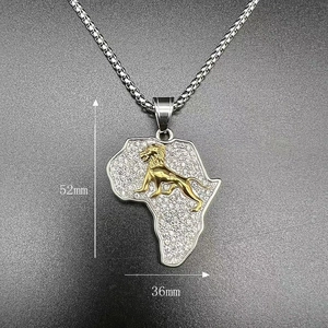 Macro detail of iced out Africa map pendant with gold lion, 52mm by 36mm size
