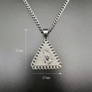 Macro view of silver-toned hip hop prayer hands pendant with detailed 51mm by 37mm dimensions