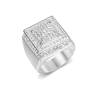 Macro shot of silver hip hop ring featuring a square pavé setting with sparkling diamonds