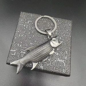 Vintage stainless steel fish-shaped keychain opener with realistic scale textures