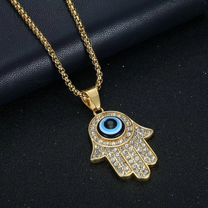 Gold Hamsa Hand pendant necklace with Evil Eye and rhinestones on box chain