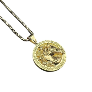 Polished gold horse head pendant necklace with greek key pattern on a classic box chain