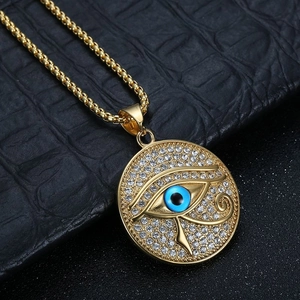 Gold plated hip hop necklace featuring Horus Eye pendant with blue bead and zircons