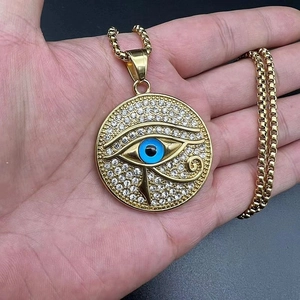 Gold plated stainless steel Eye of Horus pendant necklace with rhinestones on a thick chain