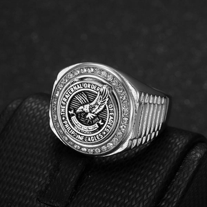 Silver-tone Philippine Eagles fraternal order ring with crystal accents on black leather