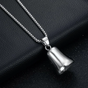 Polished stainless steel eagle guardian bell pendant with box chain on black leather