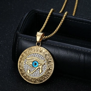 Golden Eye of Horus medallion necklace with diamonds and Egyptian hieroglyphs