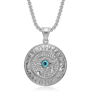 Detailed close-up of Eye of Horus pendant with blue pupil and pavé set rhinestones