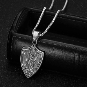 Vintage silver St. Michael Archangel shield pendant on a classic box chain
