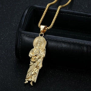 Polished gold plated St. Jude religious pendant necklace with box chain on jewelry box