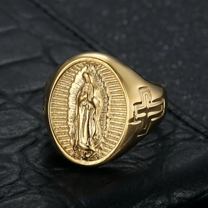 Vintage gold stainless steel oval signet ring featuring Virgin Mary and cross detail