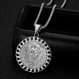 Macro shot of silver hip hop lion head pendant with sparkling pavé cubic zirconia
