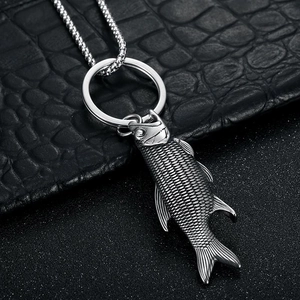 Retro stainless steel fish-shaped bottle opener keychain with textured scales on pearl chain