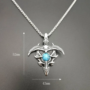 Vintage stainless steel eagle pendant with turquoise inlay and 52mm height dimension