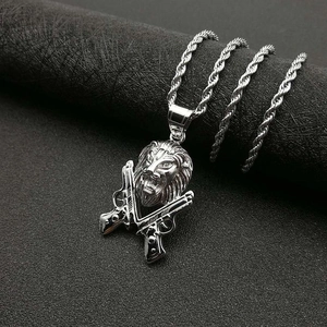 Silver hip hop lion head pendant necklace with dual pistols on a robust rope chain