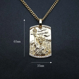 Gold plated hip hop necklace featuring Lady Liberty pendant with sparkling diamond edges