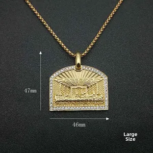 Detail of large 47mm gold hip-hop pendant with religious relief and crystal border
