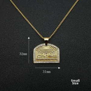 Close-up of small size gold-plated The Last Supper pendant with sparkling crystals