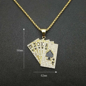 Detailed view of hip hop gold pendant with royal flush cards and rhinestone inlay
