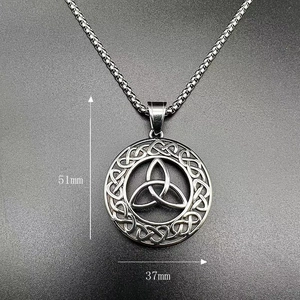 Macro view of Celtic knot pendant showing dimensions 51mm height and 37mm width