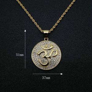Gold-plated stainless steel Om necklace with iced-out crystals and a sturdy rope chain