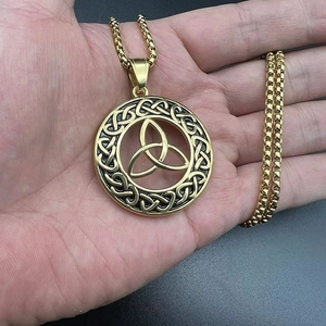 Vintage gold Viking Celtic knot pendant necklace with polished trinity knot design