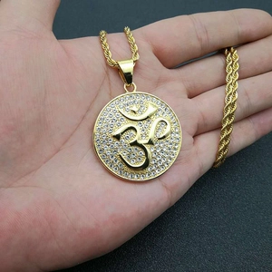 Gold-plated Hip Hop Om pendant necklace with clear crystals on a classic rope chain