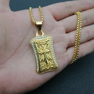 Gold plated stainless steel rectangle pendant with cross design and sparkling zircons