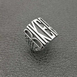 Men's polished stainless steel biker ring featuring a hollow BIKER letter design