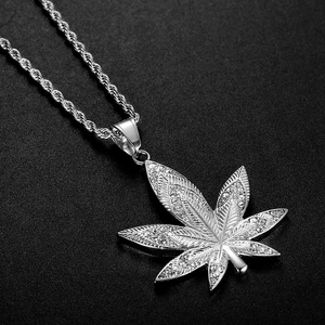 Silver iced-out maple leaf pendant necklace with micro-pave crystals on a twist rope chain